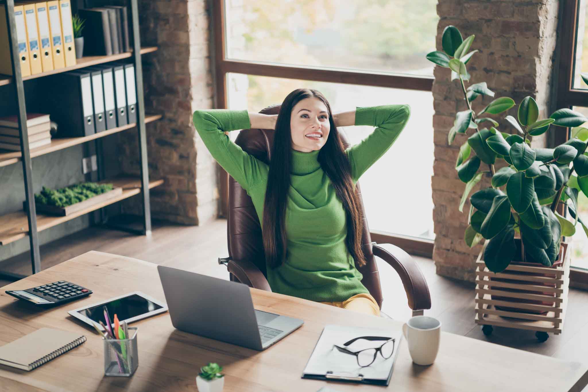 Portrait of her she nice attractive long-haired cheerful cheery lady real estate, agent broker sitting in chair having pause at modern loft industrial style interior workplace station